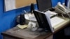 An empty spot on reporter Phyllis Zorn's desk shows where the tower for her computer sat before law enforcement officers seized it in a raid on the Marion County Record, Aug. 13, 2023, in Marion County, Kansas. 