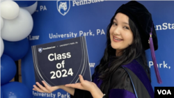 FILE - Shakhrizoda Mamasolieva is among this year's 47 Uzbek LLM graduates at Penn State Law, State College, Pennsylvania, May 10, 2024.