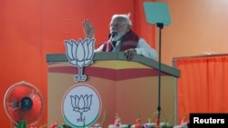 India's Prime Minister Narendra Modi delivers a speech as he attends an election campaign event at Bengaluru, Karnataka, India, April 20, 2024.
