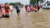 河北涿州一烧烤美食城老板发来街道被淹照片。（2023年8月2日）