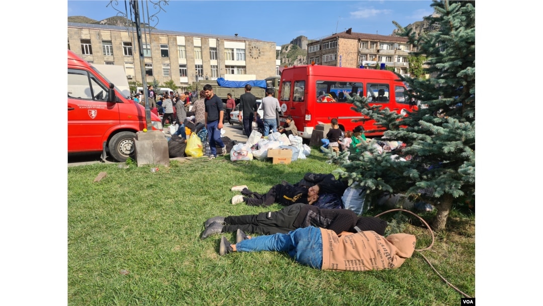 Refugees arrive in Goris, Armenia, exhausted, with many driving for up to 48 hours a distance of only about 100 kilometers, on Sept. 29, 2023. (Heather Murdock/VOA)