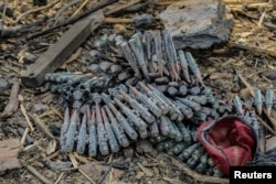 Damages and ammunition shells are seen after last night's fire that caused blasts at a military ammunition depot in N'Djamena, Chad, June 19, 2024.