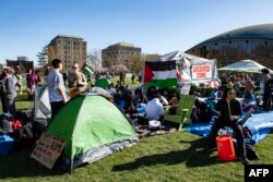 FILE—Pro-Palestinian supporters from Harvard University and the Massachusetts Institute of Technology rally at MIT at an encampment for Palestine in Cambridge, Massachusetts, on April 22, 2024.