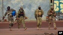 FILE - This undated photograph shows Russian Wagner Group mercenaries in northern Mali. (French Army via AP)