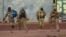 FILE - This undated photograph shows Russian Wagner Group mercenaries in northern Mali. (French Army via AP)