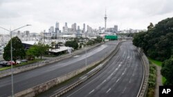 Roads leading to New Zealand's Auckland Habour Bridge is closed to all traffic, Feb. 12, 2023, as the city was hit by a cyclone. 
