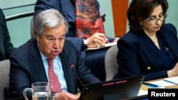 United Nations Secretary-General Antonio Guterres, speaks next to Sima Bahous, executive director of U.N. Women, during the observance of the International Women's Day 2024 at the United Nations in New York, March 8, 2024. 