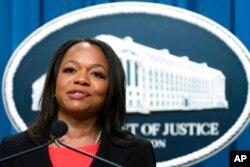 FILE - Assistant Attorney General Kristen Clarke for the Department of Justice's Civil Rights Division speaks during a news conference at the Department of Justice in Washington, Aug. 4, 2022.