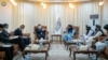 2023年5月23 日，中国驻阿富汗大使王愚（中左）在喀布尔会见塔利班内政部长西拉杰丁·哈卡尼。（照片来自阿富汗内政部）