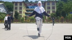 A girl skips rope on May 27, 2023, at the Tibetan Public School in Srinagar, Jammu and Kashmir, India. (Bilal Hussain/VOA)