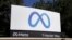 FILE - Meta's logo is seen at company headquarters in Menlo Park, California, Oct. 28, 2021. 