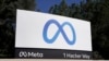 FILE - A sign advertises Meta's headquarters in Menlo Park, California, Oct. 28, 2021. On Thursday, a U.S. appeals court revived a software engineer's proposed class action claiming Meta Platforms refused to hire him because it preferred hiring foreign workers paid lower wages.