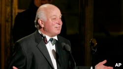 FILE - Seymour Stein accepts his award during the Rock and Roll Hall of Fame induction ceremony March 14, 2005 in New York. 
