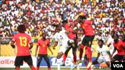 Ghana and Angola in action