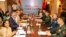 Indian Defense Minister Rajnath Singh, 3rd left, attends a meeting with his Chinese counterpart Li Shangfu, 3rd right, during the Shanghai Cooperation Organization Defense Minister's Meeting in New Delhi, April 27, 2023.