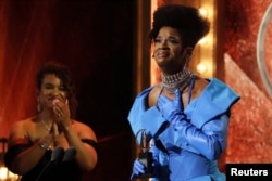 FILE - J. Harrison Ghee accepts the award for the Best Performance by an Actor in a Leading Role in a Musical for "Some Like It Hot" at the 76th Annual Tony Awards in New York City, June 11, 2023. (REUTERS/Brendan Mcdermid)