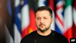 FILE - Ukraine's President Volodymyr Zelenskyy addresses a media conference prior to a meeting of NATO defense ministers at NATO headquarters in Brussels, Oct. 11, 2023. 