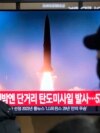 FILE - A TV screen shows a file image of a North Korean missile launch during a news program at the Seoul Railway Station in Seoul, South Korea, Dec. 18, 2023.