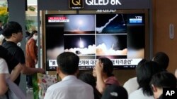 A TV screen shows images of North Korea's missile launch during a news program at the Seoul Railway Station in Seoul, South Korea, Aug. 31, 2023.