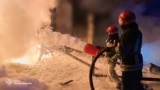 In this photo provided by the Ukrainian Emergency Service, emergency services personnel work to extinguish a fire in Ivano-Frankivsk region, Ukraine, April 27, 2024, following Russian night attacks.