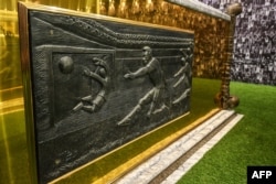 Detailed view of the coffin of late Brazilian football star Pele, in his mausoleum at the Ecumenical Necropolis Memorial cemetery in Santos, Brazil on May 15, 2023.