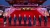 In this photo released by China's Xinhua News Agency, Chinese President Xi Jinping, center, and his wife, Peng Liyuan, fourth right, pose for a photo with Central Asian leaders at the Ziyun Tower in Xi'an in China's Shaanxi Province, May 18, 2023. 