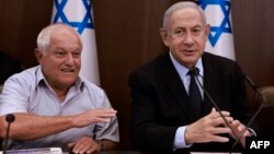 Israel's tourism minister Haim Katz, left, attends a cabinet meeting chaired by Prime Minister Benjamin Netanyahu in Jerusalem, Aug. 27, 2023. Haim traveled to Saudi Arabia on Sept. 26, 2023, the first official visit there by an Israeli cabinet member. 