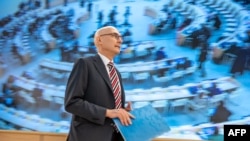 FILE: UN High Commissioner for Human Rights Volker Turk arrives to a session of the 52nd UN Human Rights Council, in Geneva. Taken Mar. 6, 2023. 