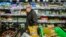 Joe Holtz, co-founder and general manager at Brooklyn's Park Slope Co-Op grocery store, Dec. 7, 2023, in New York. The store requires shoppers to mask up Wednesdays and Thursdays. 