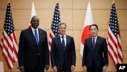 FILE - From left, U.S. Defense Secretary Lloyd Austin, U.S. Secretary of State Antony Blinken and Japanese Prime Minister Fumio Kishida meet in Tokyo, July 29, 2024. The U.S. announced this week a major upgrade of the U.S. military command in Japan.