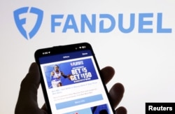 ILUSTRASI - Aplikasi dan logo Fanduel, 17 Juni 2024. (Dado Ruvic/REUTERS)