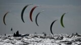 Competitors race during the final day of the 2023 Formula Kite European Championships, in Portsmouth, southern England, Sept. 24, 2023.