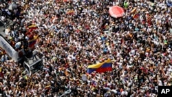 (FILE) Opposition leader Maria Corina Machado during a rally to protest official results that declared President Nicolas Maduro the winner of the July presidential election, in Caracas, Venezuela, Aug. 17, 2024. 