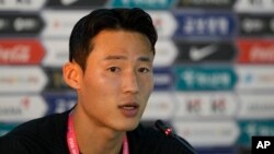 FILE - South Korea's Son Jun-ho speaks during a press conference at Al Egla Training Site 5 in Doha, Qatar, Nov. 22, 2022. Son, a star South Korean soccer player who was detained in China for nearly a year over bribery allegations has been released, March 25, 2024. 