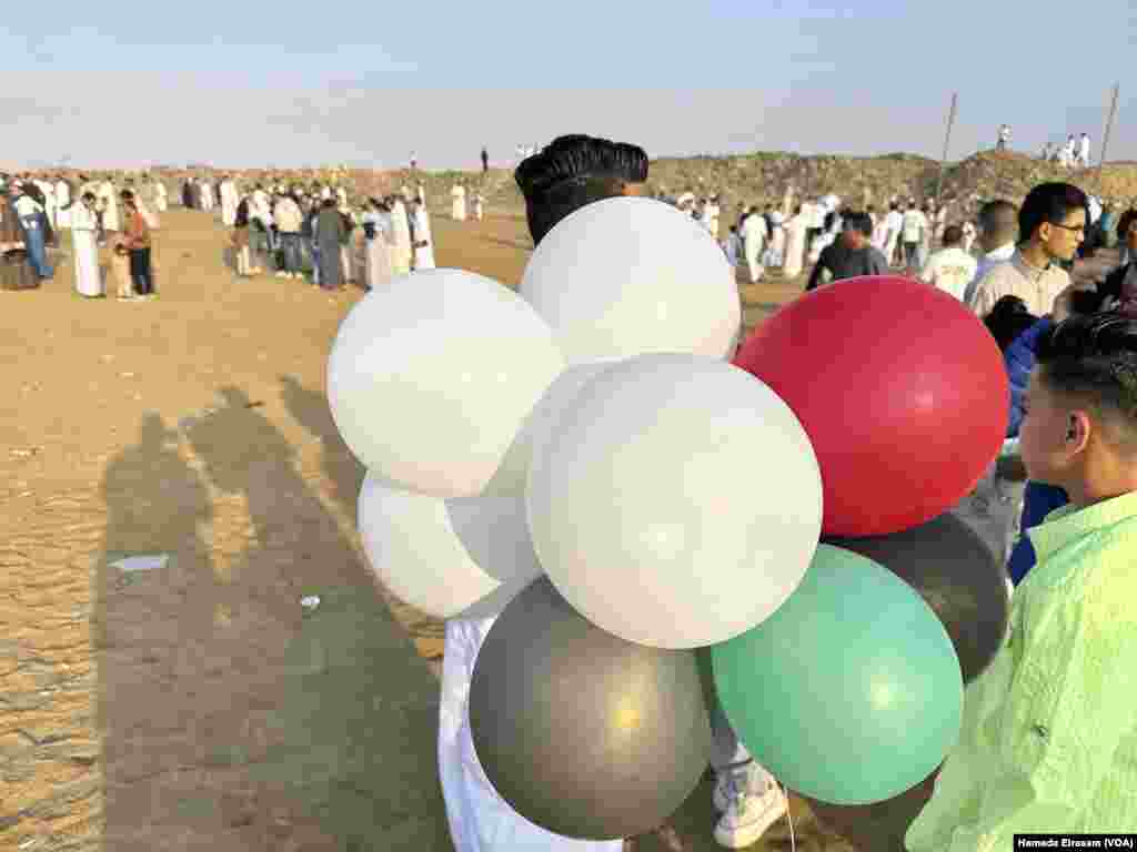 Worshippers left the celebration with balloons - and revitalized hopes for peace in Gaza. Abusir, Egypt, April 10, 2024.