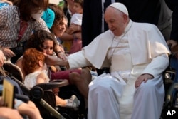 Pope Francis meets with young people with disabilities at the Catholic holy shrine of Fatima, in central Portugal, on Aug. 5, 2023.