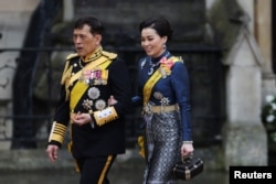 Quốc vương Thái Lan Maha Vajirusongkorn và Vương hậu Suthida đến dự lễ đăng quang của Quốc vương Charles và Vương hậu Camilla của Anh tại Tu viện Westminster, ở London, ngày 6 tháng 5 năm 2023.