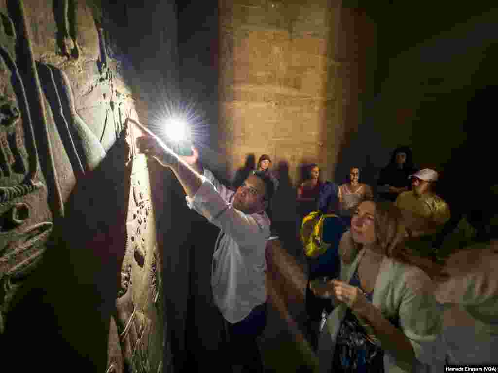 In the Philae temple complex, the festival’s participants learn about ancient Egyptian history and the country’s current challenges, such as daily nationwide power cuts. Aswan, Egypt, April 24, 2024.