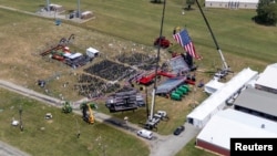 Una vista desde un dron muestra el escenario donde estuvo el candidato presidencial republicano y expresidente de Estados Unidos, Donald Trump, cuando un hombre intentó asesinarlo en Butler, Pensilvania, Estados Unidos, el 14 de julio de 2024.