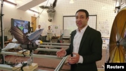 Dr. Mostafa Hassanalian, New Mexico Tech, with fake bird drone