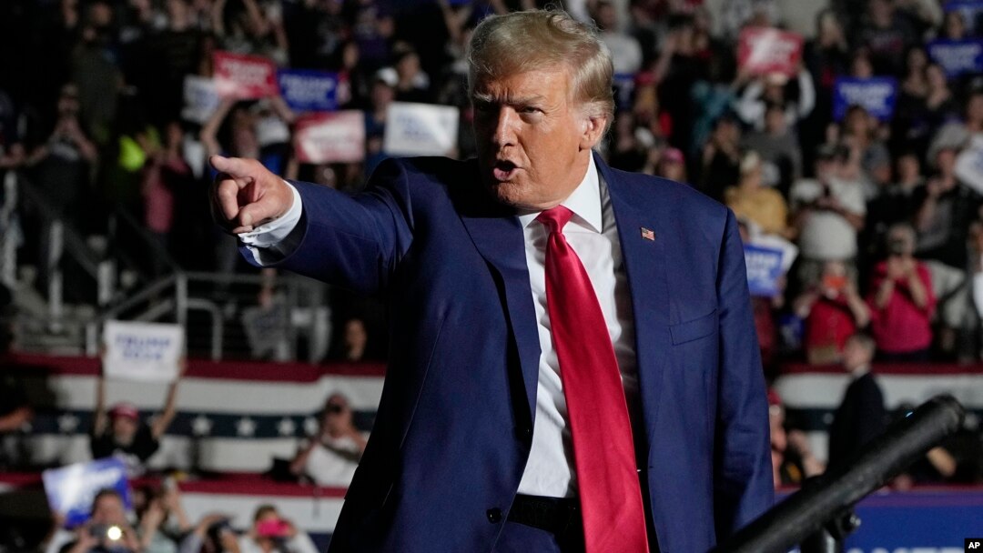 FILE - Republican presidential candidate and former President Donald Trump arrives for a campaign rally in Erie, Pennsylvania, July 29, 2023.