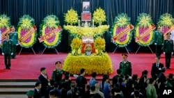 People line up to pay respects to Vietnam's General Secretary of the Communist Party Nguyen Phu Trong in Hanoi, Vietnam, July 26, 2024.