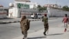 FILE - Somali security forces guard the entrance to the SYL hotel in Mogadishu, Dec. 11, 2019. The extremist group al-Shabab said March 14, 2024, that its fighters had attacked and penetrated the hotel, which is not far from the presidential palace.