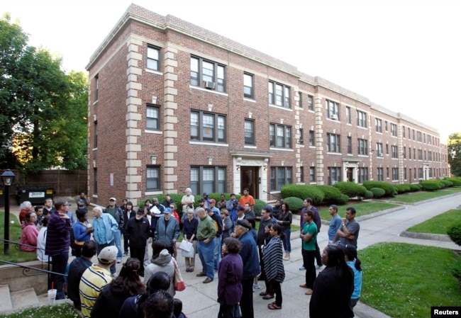 FILE -- Tenants gather to battle proposed rent increases in Malden, Massachusetts, currently the most expensive state to rent an apartment in.