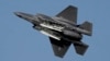 FILE - A U.S. F-35 fighter jet performs during the opening day of the Dubai Air Show, United Arab Emirates, Nov. 13, 2023. Greece formally approved an offer to buy 20 F-35 Joint Strike Fighters from the United States, government officials said, July 25, 2024. 