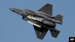 FILE - A U.S. F-35 fighter jet performs during the opening day of the Dubai Air Show, United Arab Emirates, Nov. 13, 2023. Greece formally approved an offer to buy 20 F-35 Joint Strike Fighters from the United States, government officials said, July 25, 2024. 