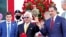 FILE - Bob Baffert, center, holds the trophy after Medina Spring won the 147th Kentucky Derby in Louisville, Ky., on May 1, 2021, but then failed a post-race drug test that led to a suspension for Baffert, the horse's trainer. (Jim Owens-USA Today Sports via Reuters)