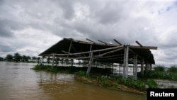 FILE - A rice nursery shed located on a 50-hectare rice farm is flooded in Makurdi, Nigeria, Oct. 1, 2022.