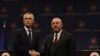 Turkey's Foreign Minister Mevlut Cavusoglu, right, NATO Secretary General Jens Stoltenberg pose after a joint press conference in Ankara, Turkey, Feb. 16, 2023. 