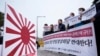 Protesters stage a rally to oppose the visit of South Korean President Yoon Suk Yeol to Japan, in front of the presidential office in Seoul, South Korea, March 16, 2023.